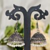Silver jhumka earrings with bead detailing