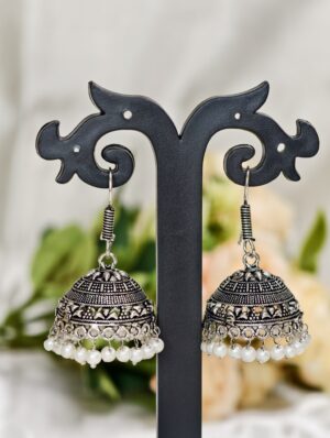 Silver jhumka earrings with bead detailing